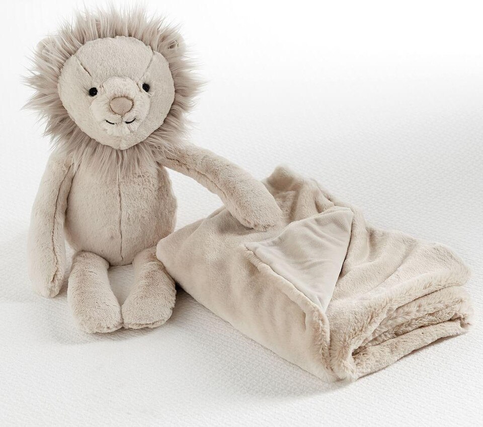 stuffed animal with blanket attached